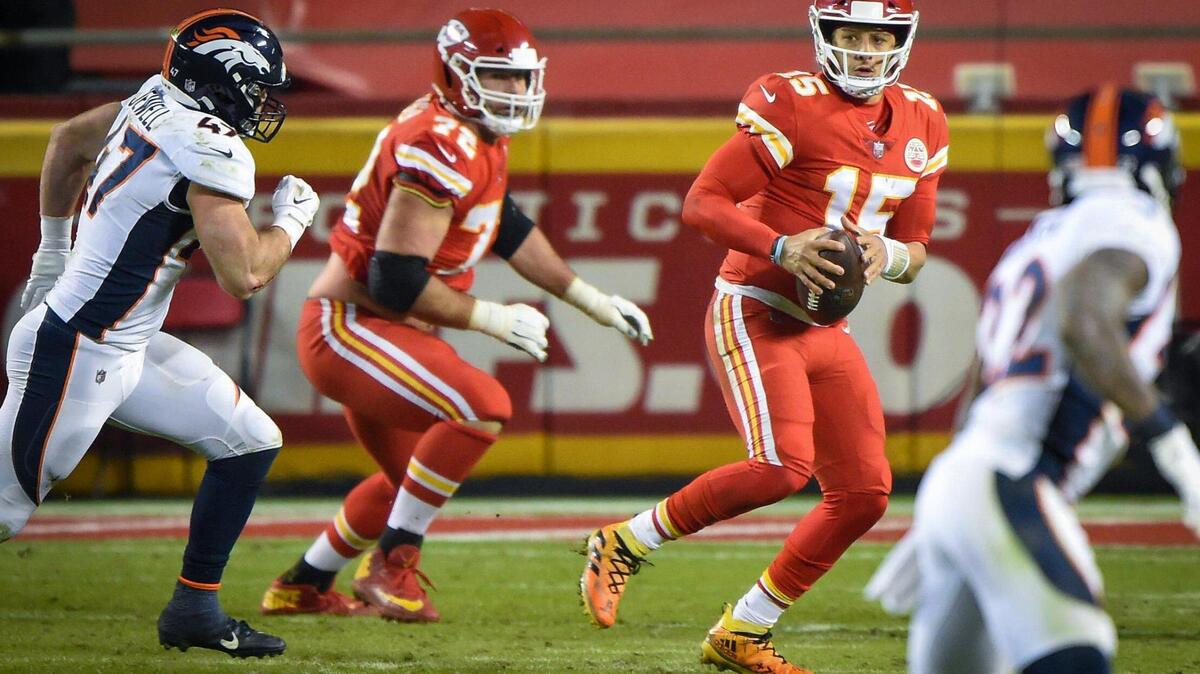 Kansas City Chiefs quarterback Patrick Mahomes (15) was rushed before getting a pass off to Kansas wide receiver Tyreek Hill in the second-half against the Denver Broncos at Arrowhead Stadium on Sunday, Dec. 6, 2020, in Kansas City. The Chiefs defeated the Broncos, 22-16.