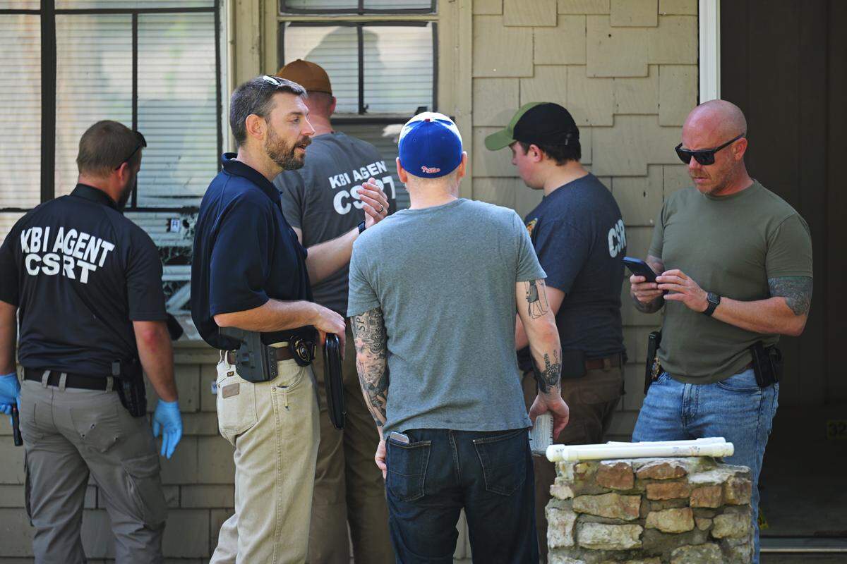 KBI agents were on the scene in the 2600 block of S. 30th Street in Kansas City, Kansas, on Sunday, July 27, 2025, investigating the scene where Wyandotte County Sheriff's deputy Elijah Ming was shot Saturday while responding to a call.