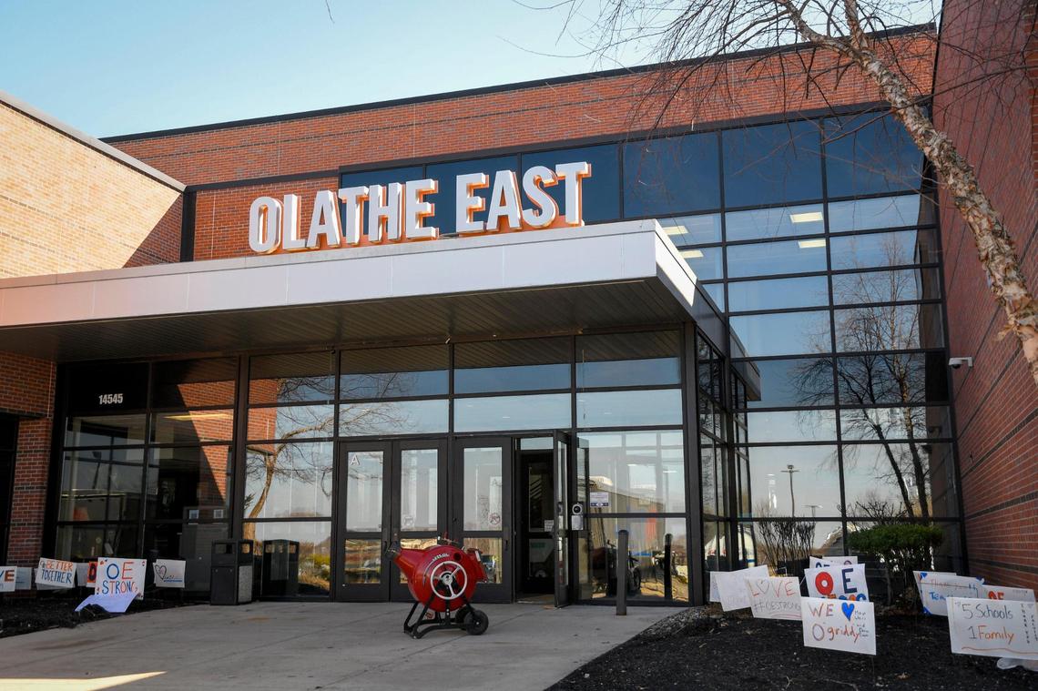 After the March 4 shooting at Olathe East High School, signs of support were placed outside the entrance.