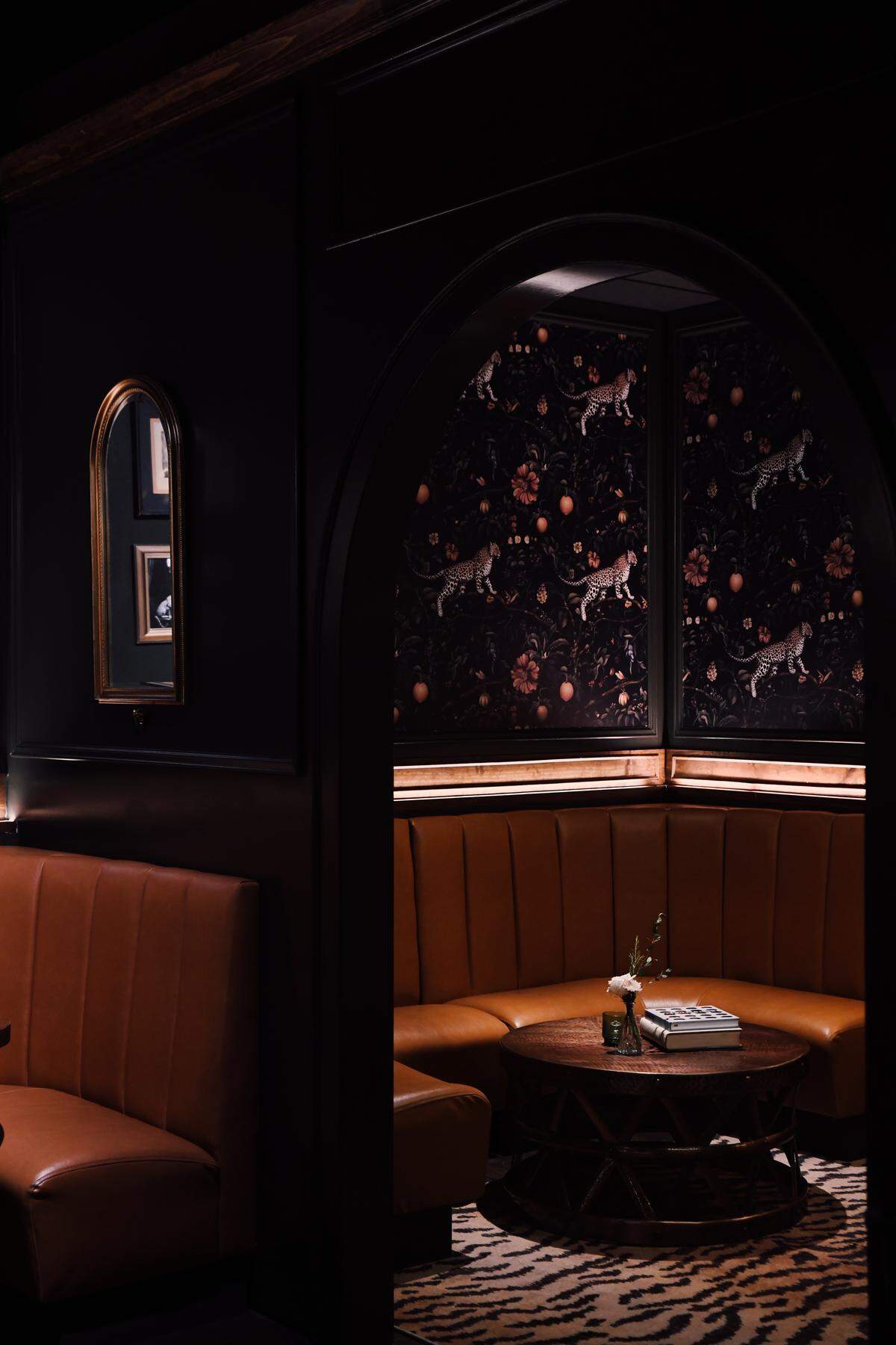 Cleo Club is a dimly lit bar in the Crossroads with plush seats and tried-and-true drinks.