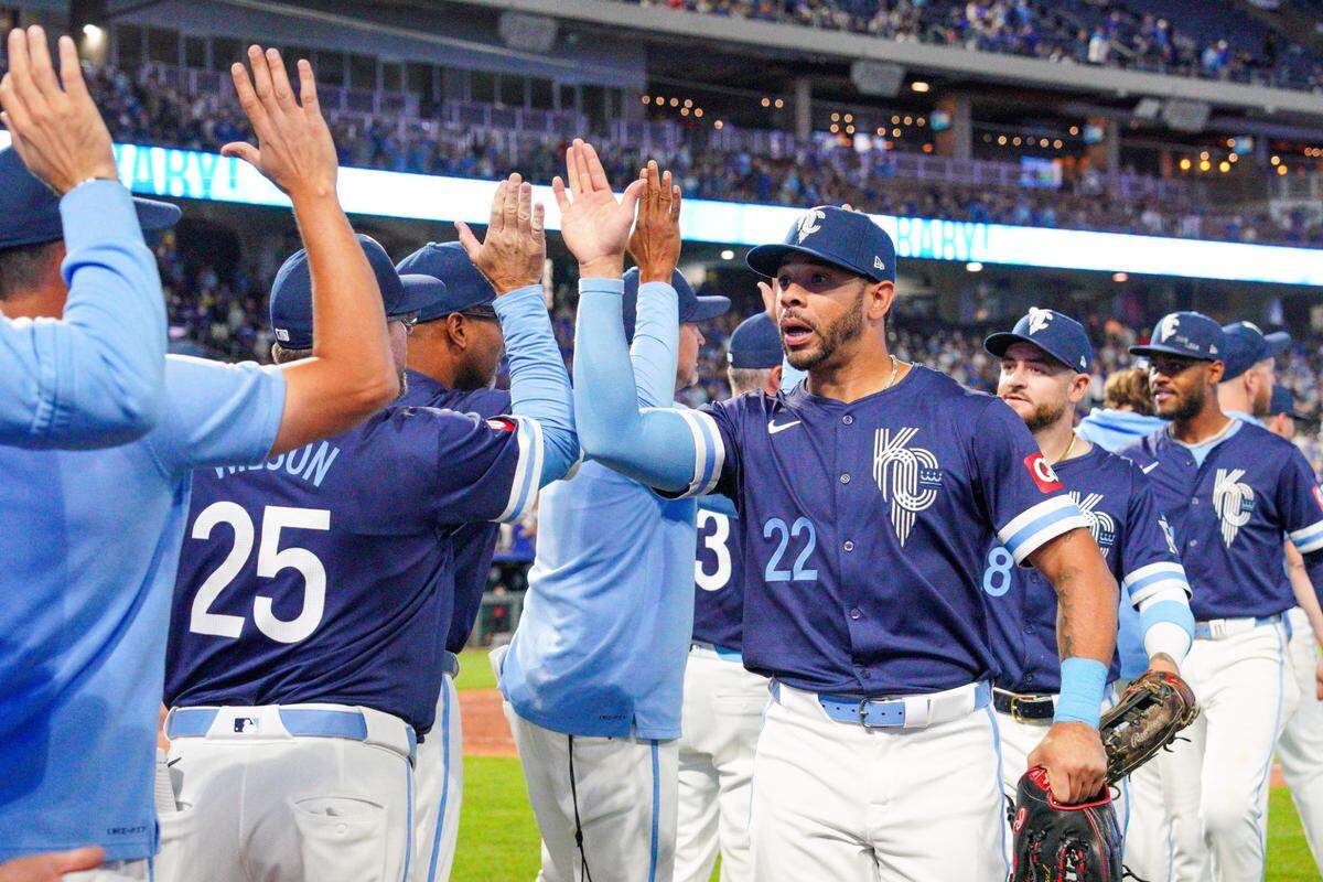 Kansas City Royals left fielder Tommy Pham (22) celebrates with teammates after the win over the Minnesota Twins at Kauffman Stadium on Sep 6, 2024 in Kansas City, Missouri, USA.