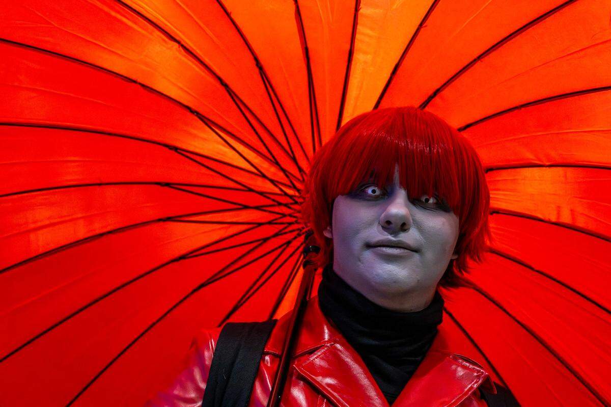 Victor Jameson cosplays as the character Mr. Scarletella while attending Planet Comicon at the Kansas City Convention Center on Friday, March 21, 2025.