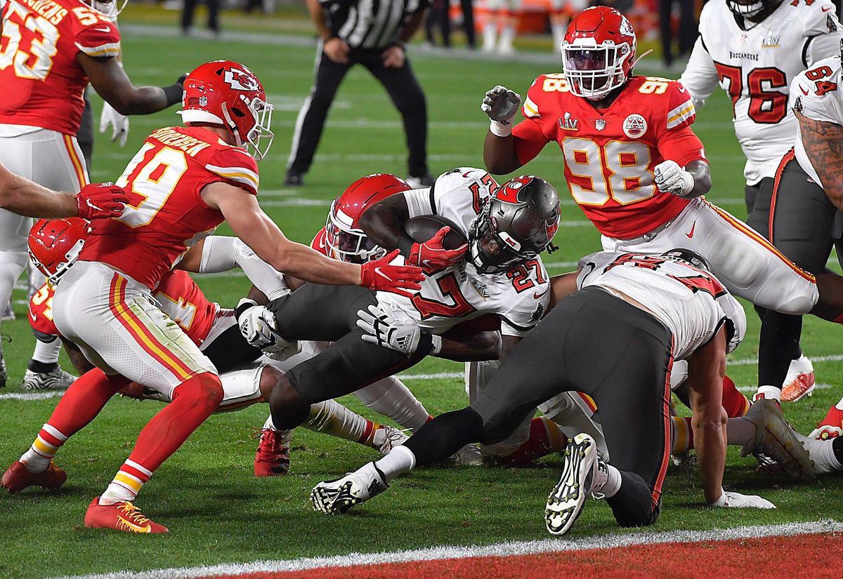 The Kansas City Chiefs’ defense stops Tampa Bay Buccaneers running back Ronald Jones from reaching the end zone on fourth down in the second quarter Sunday, February 7, 2021, at Super Bowl LV at Raymond James Stadium in Tampa, Florida.
