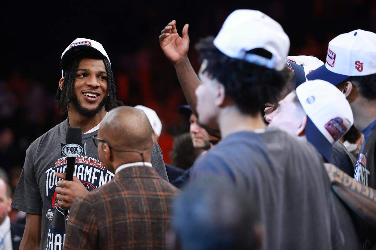Zuby Ejiofor #24 of the St. John’s Red Storm celebrates after receiving the David R. Gavitt Most Outstanding Player Award after the 2026 Big East Men’s Tournament Championship game against the Connecticut Huskies at Madison Square Garden on March 14, 2026 in New York City.