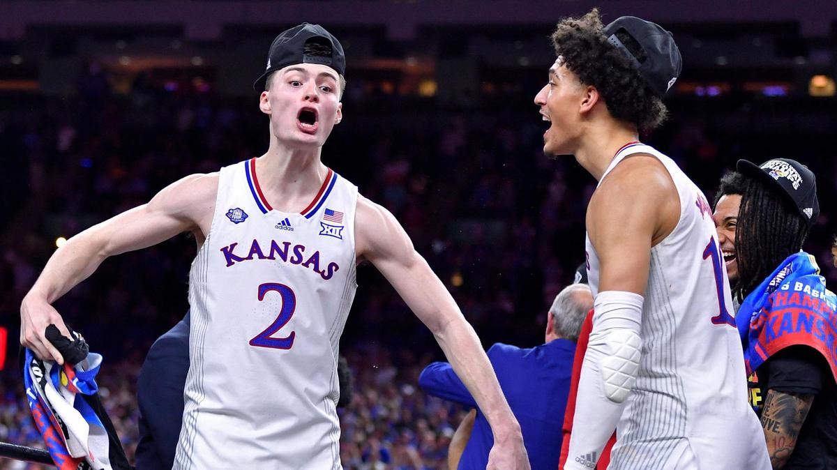 KU’s Christian Braun, left, and Jalen Wilson celebrate the Jayhawks NCAA title Monday night at the Superdome.