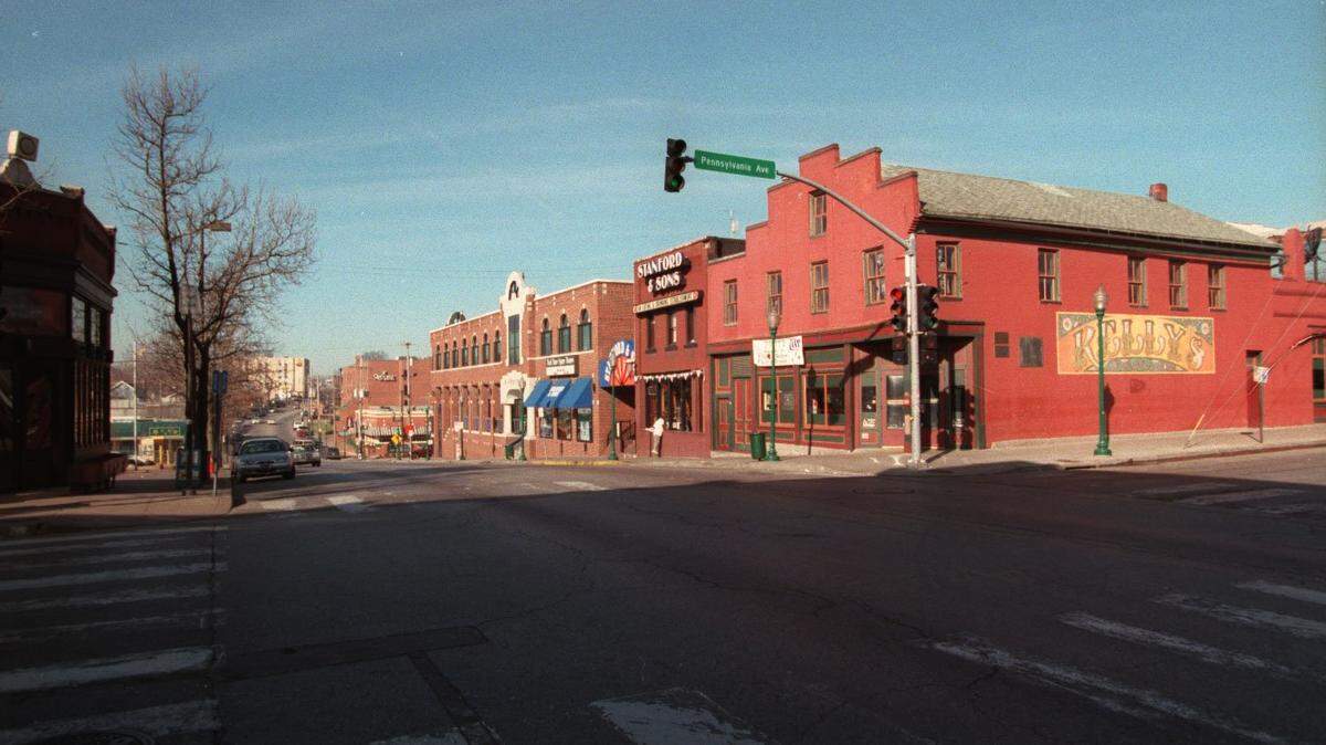 A woman died in an overnight shooting in a parking lot in the Westport entertainment district in Kansas City.