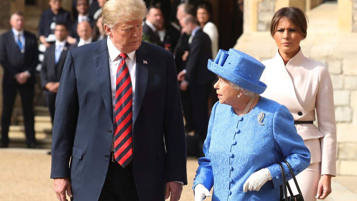 Britain’s Queen Elizabeth II, right, Donald Trump and first lady Melania Trrump walk from the Quadrangle after inspecting the Guard of Honour, during the president’s visit to Windsor Castle on Friday. Much has been made on social media about the Queen’s choice of jewelry while Trump was in town - including this brooch shown here worn to her father’s funeral by her mother.