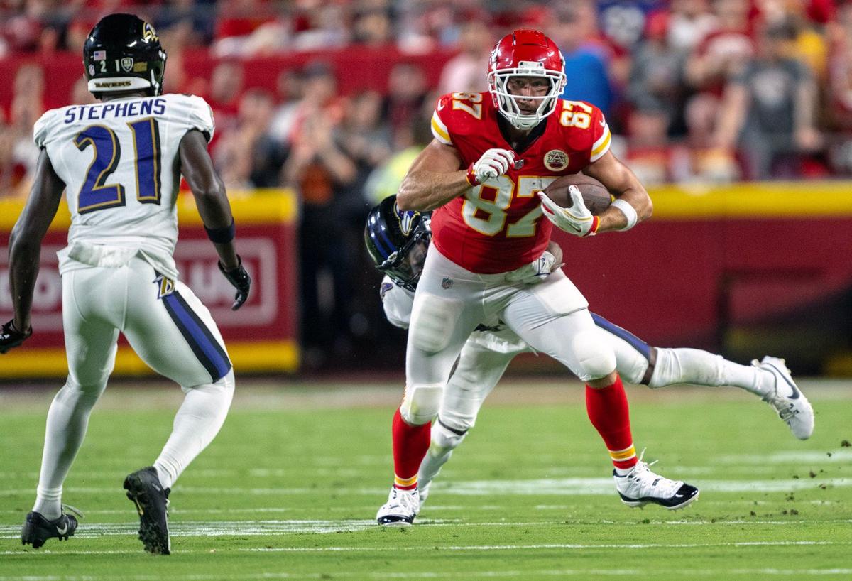 Kansas City Chiefs tight end Travis Kelce (87) runs for a gain against Baltimore In the first half on Thursday, Sept. 5, 2024, at GEHA Field at Arrowhead Stadium.