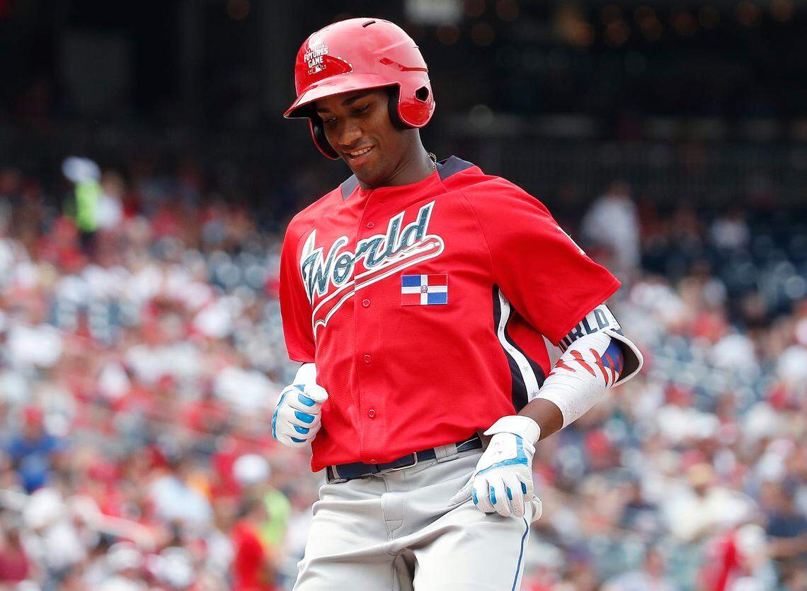 World Team Seuly Matias, of the Kansas City Royals, moves to the plate after hitting a home run against the U.S. Team in the second inning of the All-Star Futures baseball game, Sunday, July 15, 2018, at Nationals Park, in Washington. The the 89th MLB baseball All-Star Game will be played Tuesday. (AP Photo/Alex Brandon)