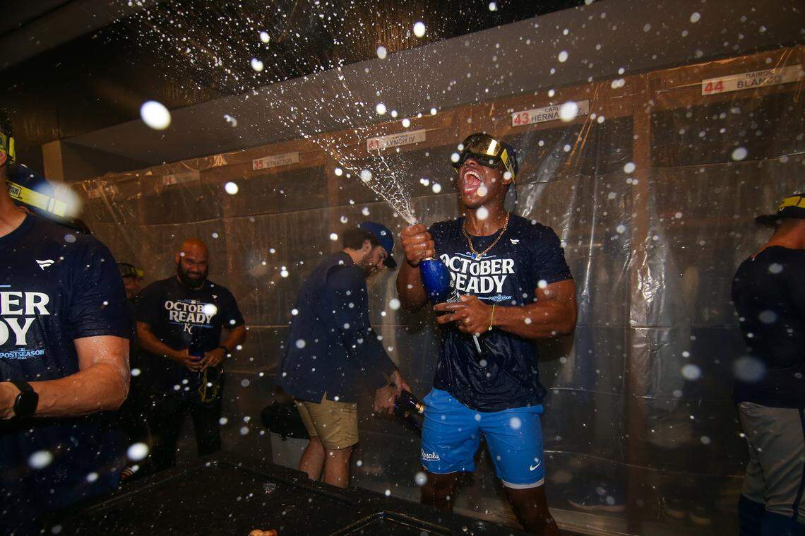 Kansas City Royals outfielder Dairon Blanco (44) celebrates after clinching a wild card playoff birth after a game against the Atlanta Braves at Truist Park.