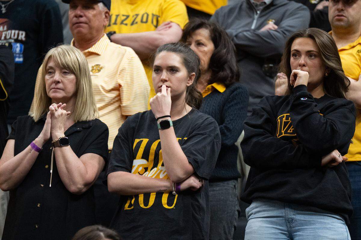 Missouri Tigers fans looks on in worry as the team falls behind the Miami Hurricanes in the second half of the Tigers first-round NCAA Tournament matchup vs. the Miami Hurricanes at Enterprise Center in St. Louis on Friday, March 20, 2026.