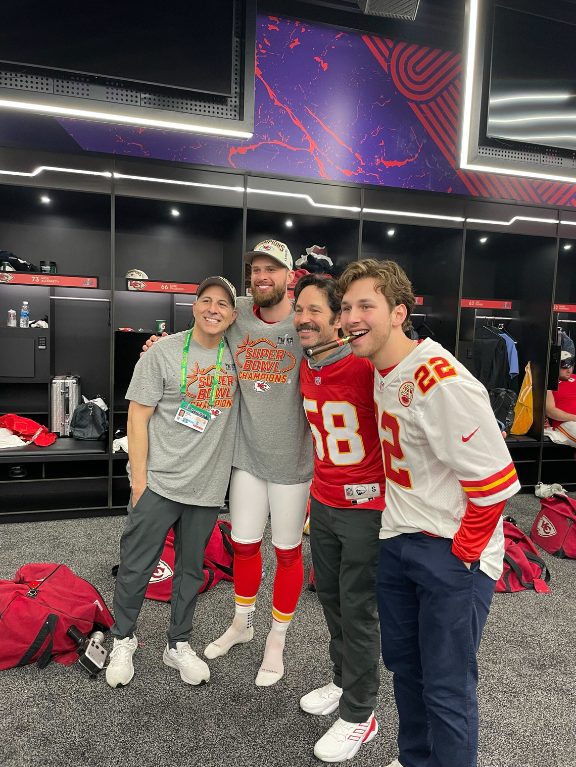 Paul Rudd, third from left, celebrated with the Kansas City Chiefs in their Las Vegas locker room after they won the Super Bowl last month. Here he is with (from left) Rob Alberino, Chiefs vice president of content and production, Chiefs kicker Harrison Butker and his son, Jack Rudd.