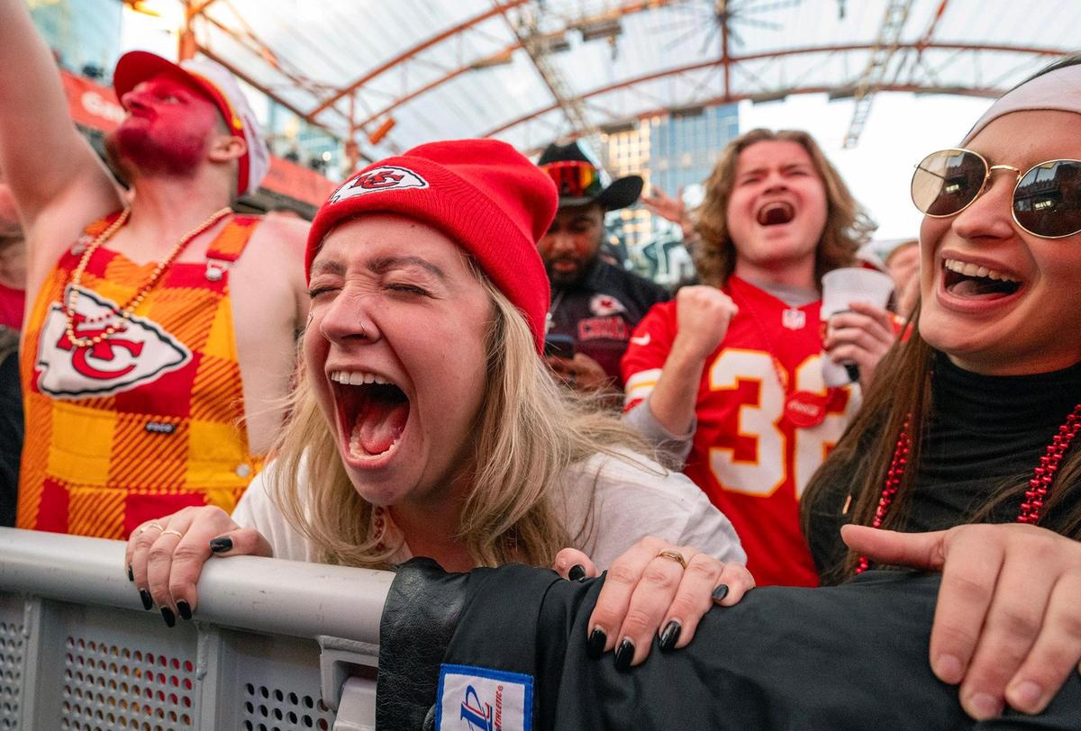 Chiefs fans including Shayla Millie of Independence, second from left, yelled as she celebrated at KC Live! in the Kansas City Power & Light District as the Chiefs defeated the Ravens, 17-10, for the AFC Championship on Sunday, Jan. 26, 2024, in Kansas City.