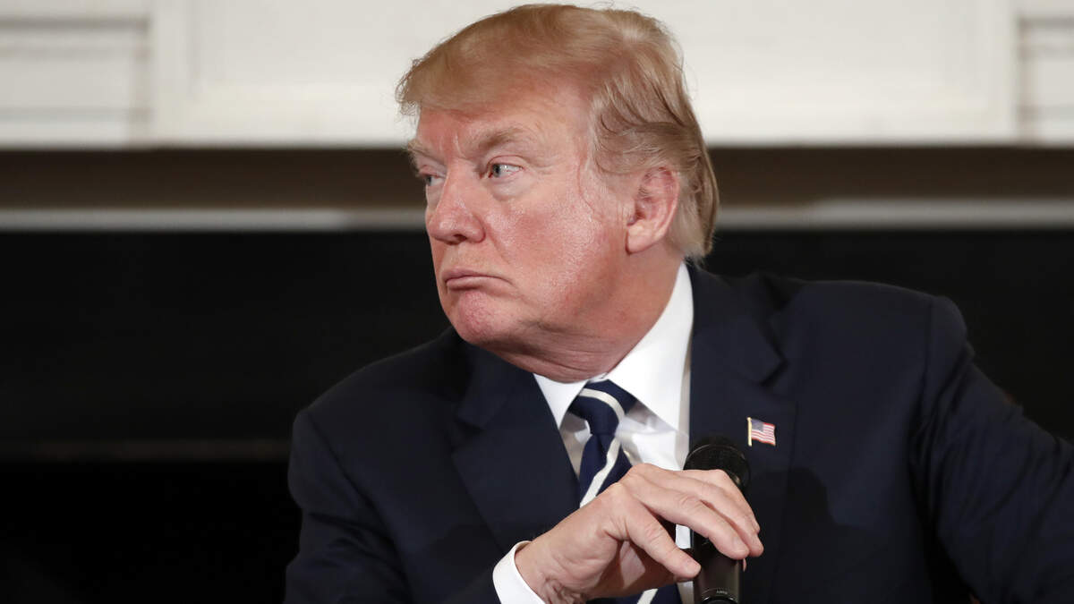 Republican candidates in Kansas largely are aligning themselves with President Donald Trump. Among Democrats, the way they approach Trump varies.
