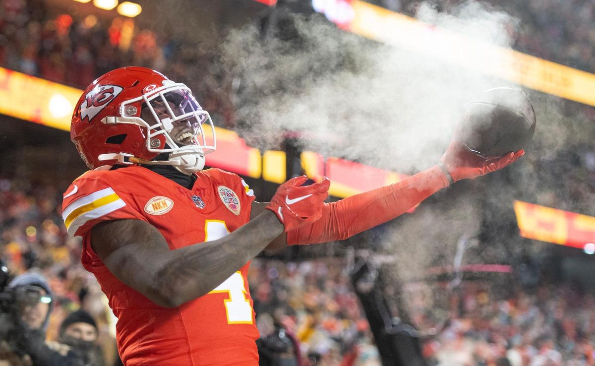 Kansas City Chiefs wide receiver Rashee Rice (4) celebrates a touchdown reception against the Miami Dolphins during an AFC Wild Card game at GEHA Field at Arrowhead Stadium on Saturday, Jan. 13, 2024, in Kansas City.