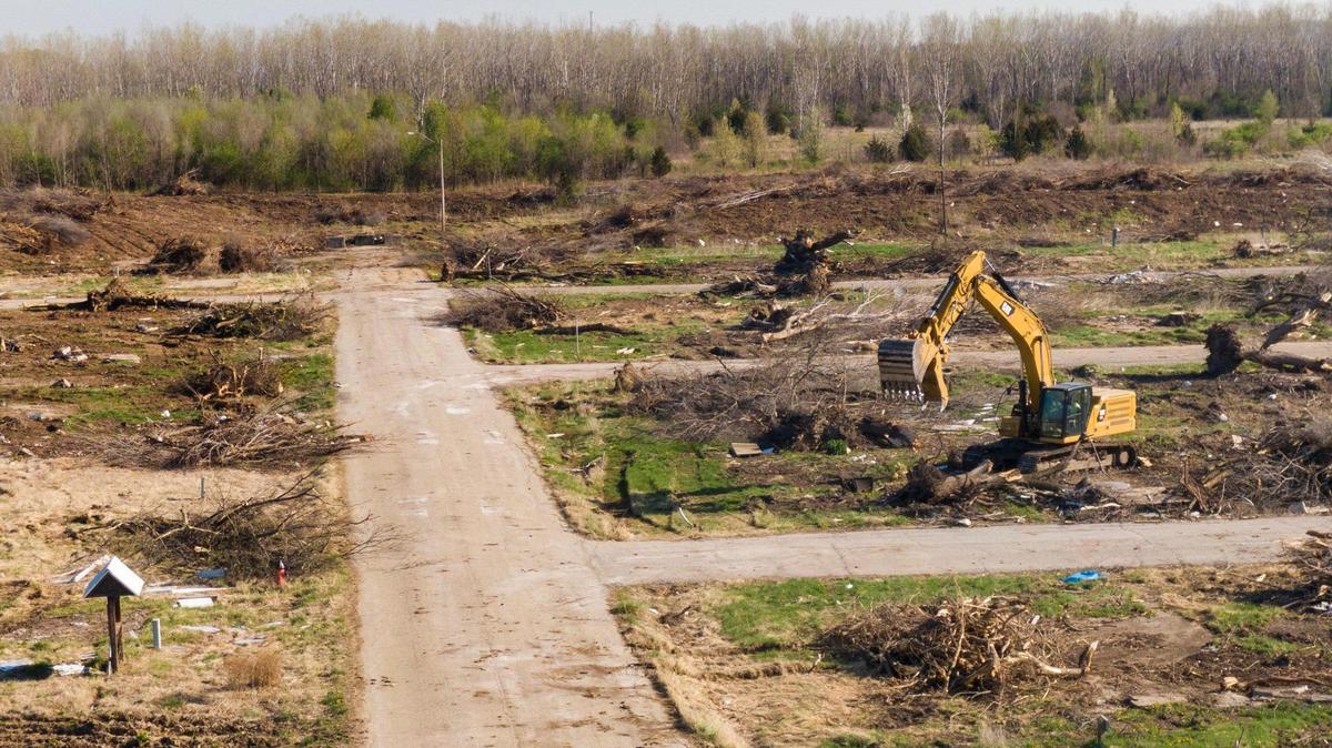 Heavy equipment removed trees in April on the site of the new Jackson County Detention Center. Foundation work will begin this fall.