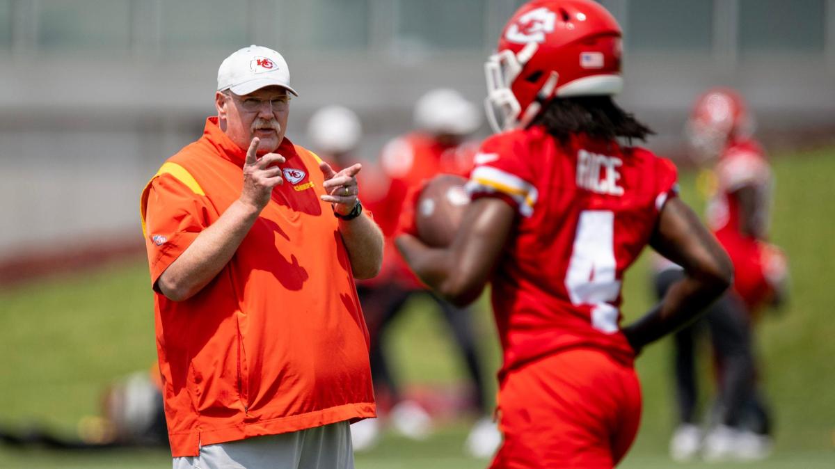 Kansas City Chiefs head coach Andy Reid talks to wide receiver Rashee Rice during a practice on Thursday, June 1, 2023, in Kansas City.