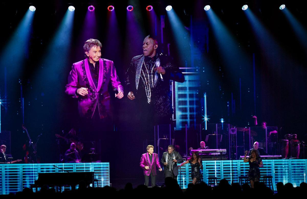 Barry Manilow performs on stage Sunday at the T-Mobile Center during a stop in Kansas City as part of The Last Concerts Tour.