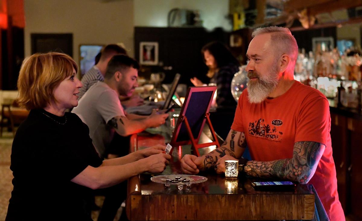 After Heather Hamilton learned she was gene-positive for Huntington’s disease, she and her husband, Sean Smith, sold their Waldo home, cashed out some retirement savings, and bought a historic building in the West Bottoms. They live upstairs and, last year, opened a bar called 9th & State on the first floor.
