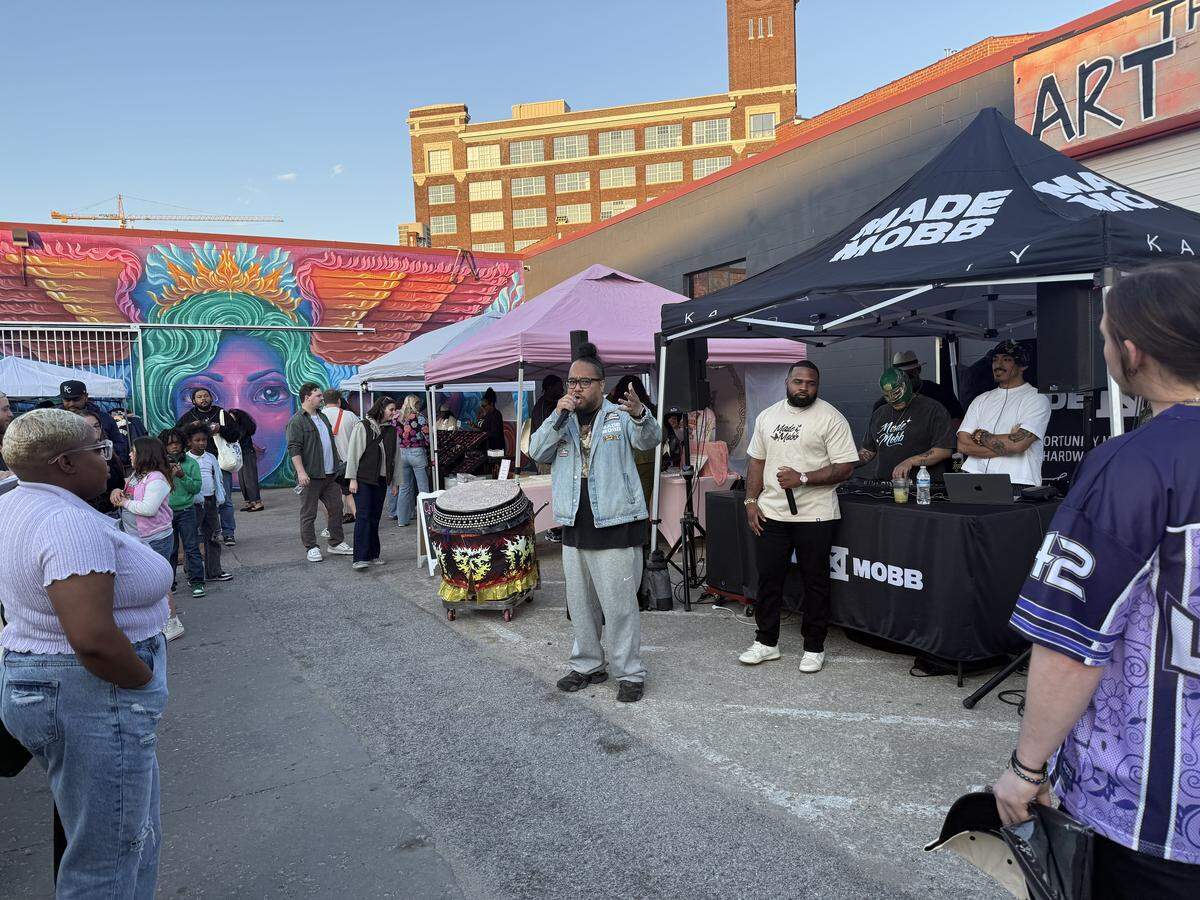 Mark Launiu (middle) at First Friday on May 1, 2026, in Kansas City, Missouri. Launiu is one of the founders of Kansas City based streetwear brand MADE MOBB.