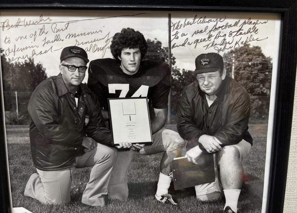 Mizzou tackle Keith Morrissey photographed with his Lineman of the Week award from Sports Illustrated, photographed with coach Al Onofrio (left) and John Kadlec.
