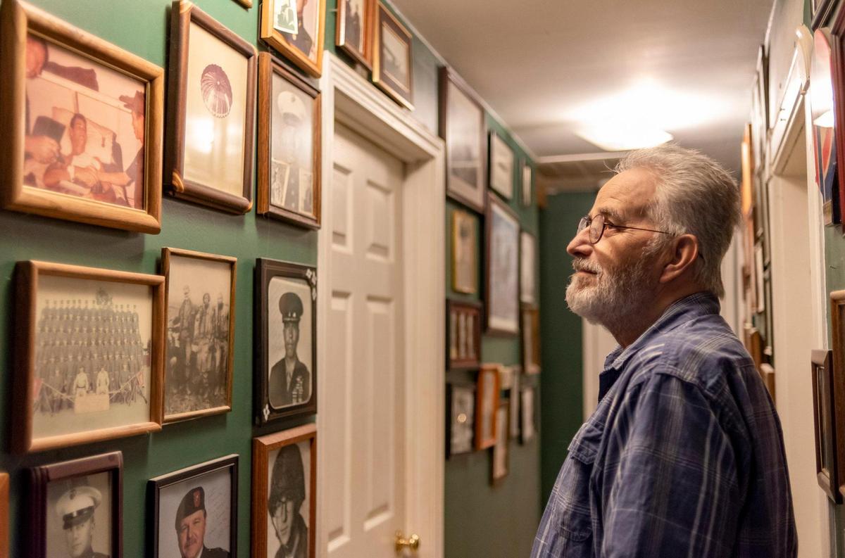 Vietnam veteran John Musgrave created what he calls a “Wall of Honor” in his Baldwin City home in memory of some of his close friends from the war, many of whom died there.