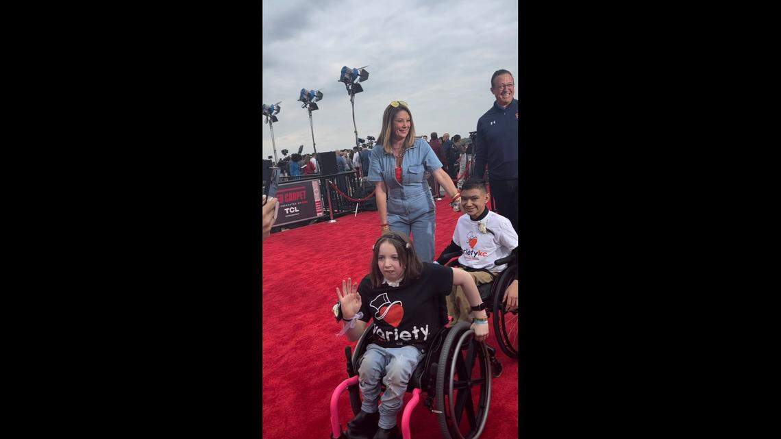 Randi Mahomes, mother of Chiefs quarterback Patrick Mahomes, walked the red carpet next to two children with Variety KC, a nonprofit for kids with disabilities.