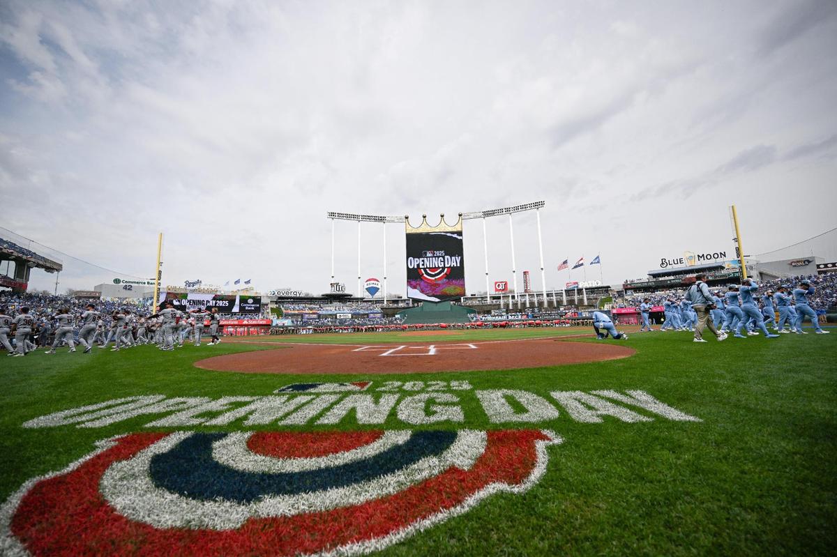 The Kansas City Royals and the Cleveland Guardians head for their dugouts to play ball after the opening ceremonies during the opening day game Thursday, March 27, 2025, at Kauffman Stadium.