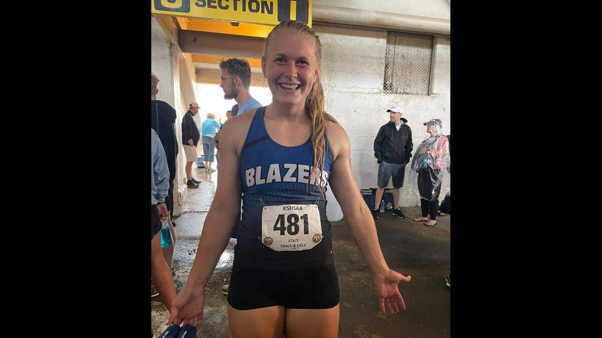 If you’ve ever attended the ginormous Kansas track and field championships in Wichita, you might recognize where Gardner Edgerton’s Kendra Wait is in this photo (the underside of venerable Cessna Stadium).