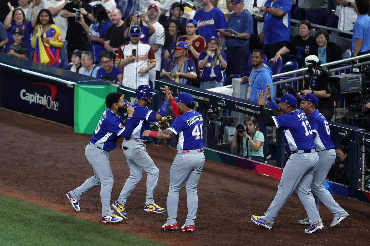 Team Venezuela celebrates during a World Baseball Classic game against Team Italy on March 16, 2026 in Miami.