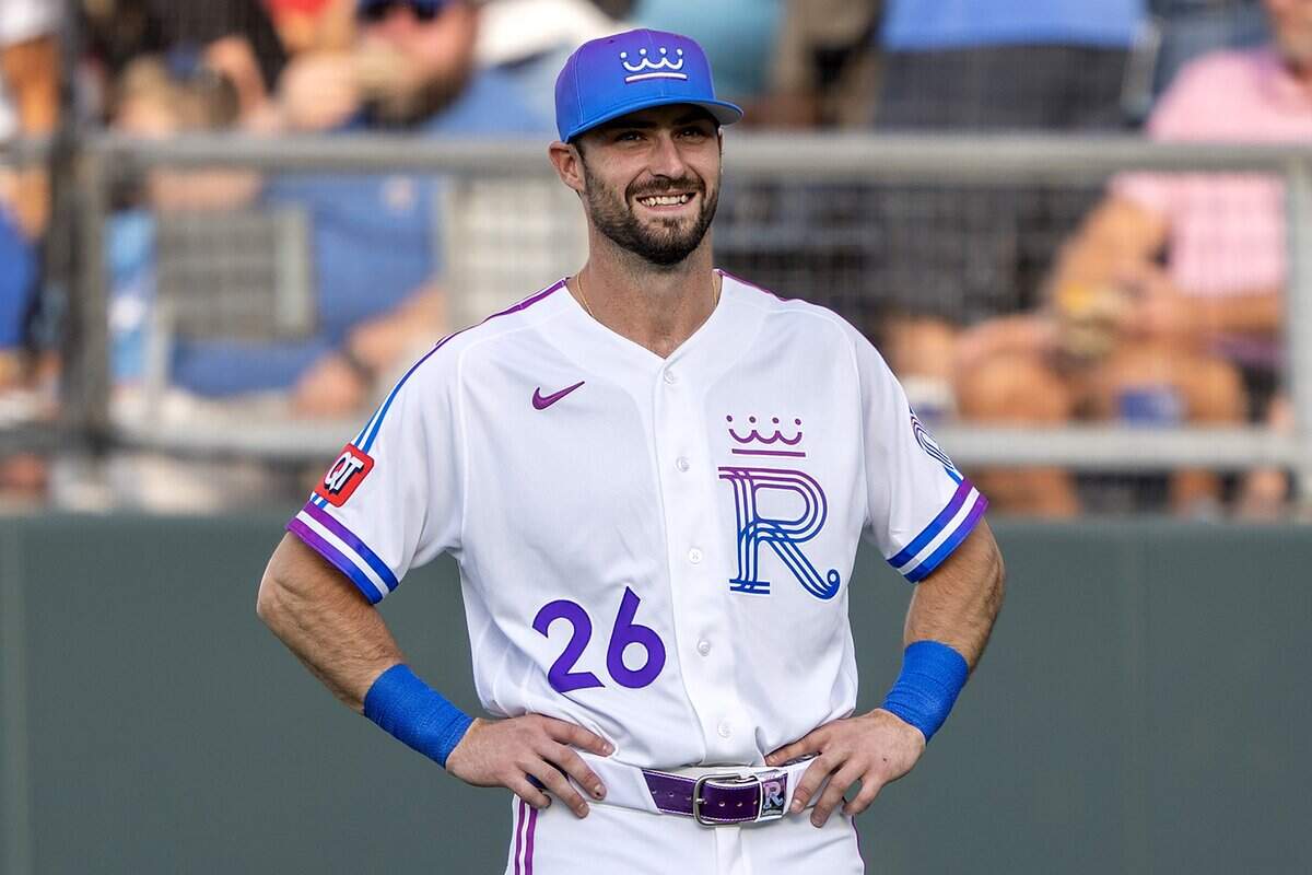 Kansas City Royals center fielder Kameron Misner (26), wearing the team's new "Forever Fountains" City Connect uniform, warms up before a game against the Houston Astros on Friday, June 12, 2026, at Kauffman Stadium in Kansas City.