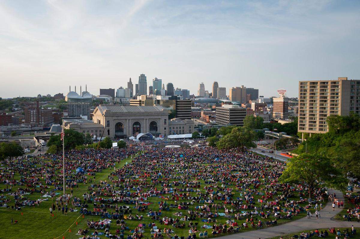 Crowds fill in the North Lawn of the National World War 1 Museum just before the start of the Celebration at the Station, an event hosted by the Kansas City Symphony on May 29, 2022, in Kansas City.