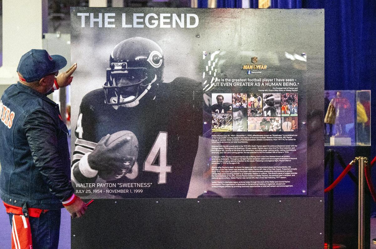 Milton Cheek of San Francisco paid tribute to Walter Payton know as “Sweetness,” one of his favorite players, as he took in the Super Bowl Experience, on Thursday, Feb. 8, 2024, in Las Vegas, Nevada. “I loved him,” said Cheek.