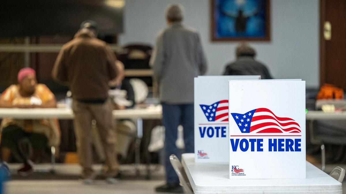 Voters checked in Tuesday at the Paradise Baptist Church in Kansas City before casting their ballots.