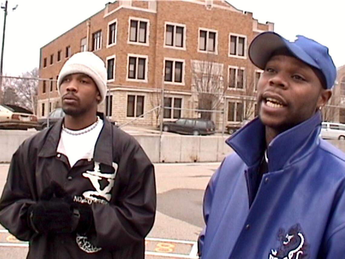 Stu “Str8jakkett” Tidwell and Barry “Killa the Hun” Rice, outside their old grade school, Lowman Hill Elementary in Topeka.
