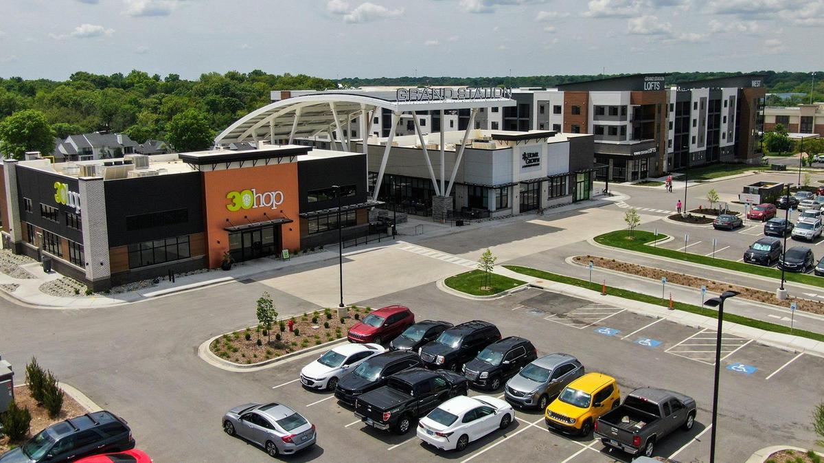 What was once a Kmart site in Merriam is now a vibrant area featuring the Grand Station Lofts luxury apartments and numerous new restaurants and other small businesses. 050625
