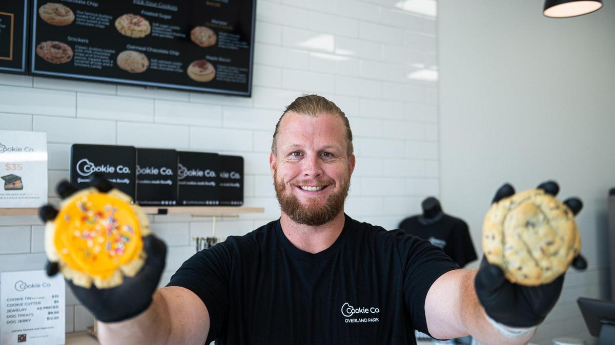 Former Kansas City Chiefs offensive lineman Jordan Devey stands for a portrait at his gourmet cookie shop Cookies Co. on June 13, 2023, in Overland Park. Devey played for the Chiefs for the 2017 and 2018 seasons and opened Cookies Co. in May 2023.