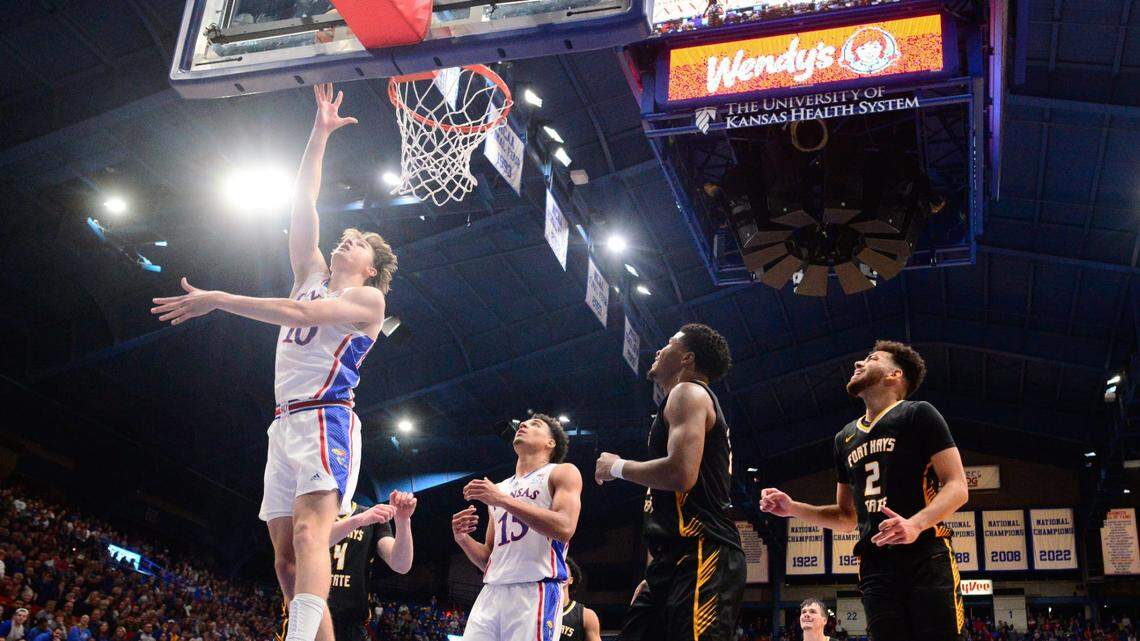 Kansas freshman guard Johnny Furphy (10) lays the ball in against Fort Hays State during the first half of Wednesday’s exhibition game inside Allen Fieldhouse.