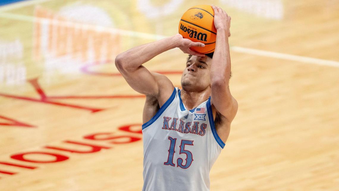 Kansas Jayhawks guard Kevin McCullar Jr. (15) shoots a free throw during an NCAA basketball game against the KC Roos on Tuesday, Dec. 5, 2023, in Lawrence, Kan.