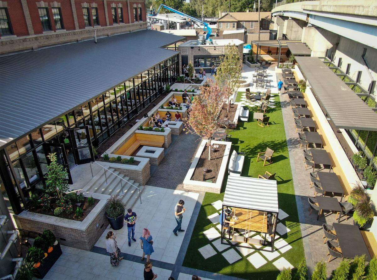 Employees from Intouch Solutions gathered for a September event at J. Rieger & Co.’s new Electric Park Garden Bar at the historic distillery, 2700 Guinotte Ave. The space features three fire pits, seating, a bar and an atrium area.