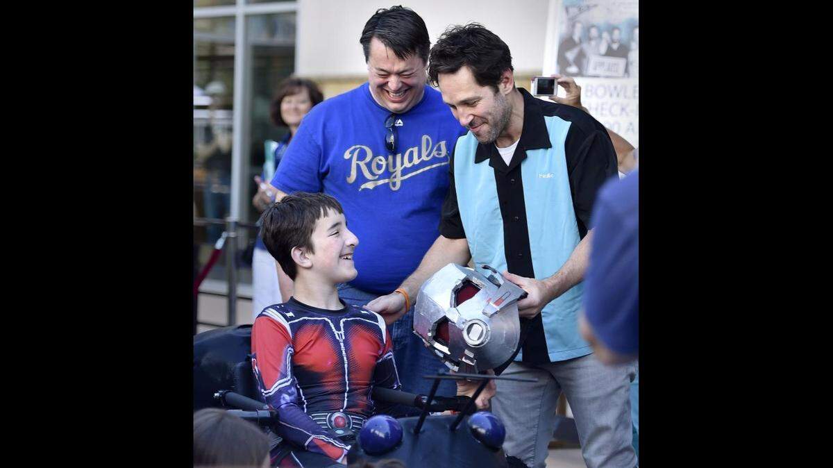 At Big Slick in 2017, Reese Davis, 12, and his father, Lon Davis, showed Paul Rudd — Ant-Man himself — their “Ant-Man” wheelchair costume.