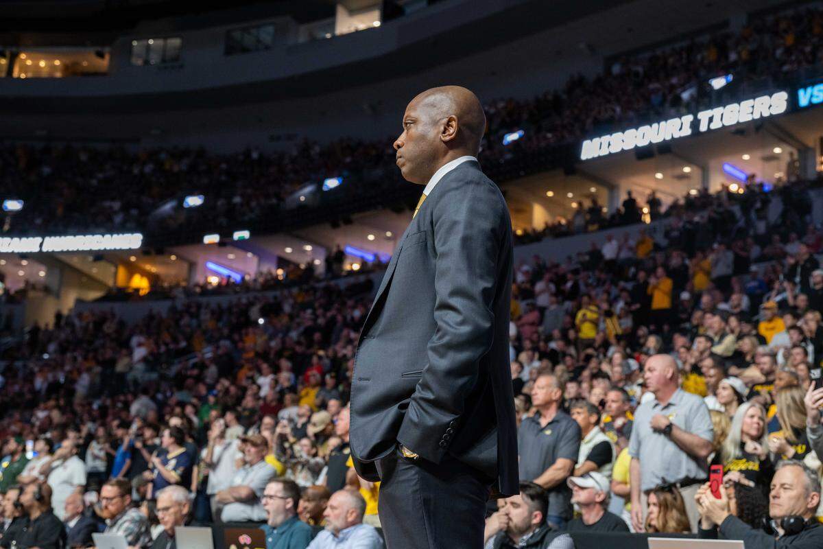 Missouri Tigers head coach Dennis Gates stands on the opposite end of the court prior to the Tigers first-round NCAA Tournament matchup vs. the Miami Hurricanes at Enterprise Center in St. Louis on Friday, March 20, 2026.