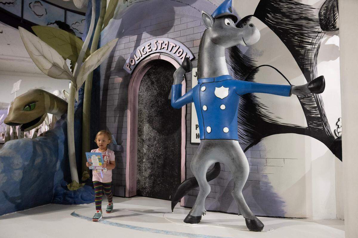 Two-and-a-half-year-old Sloane Baisden of Kansas City was among the first visitors to The Rabbit hOle when it opened March 12, 2024, in North Kansas City.