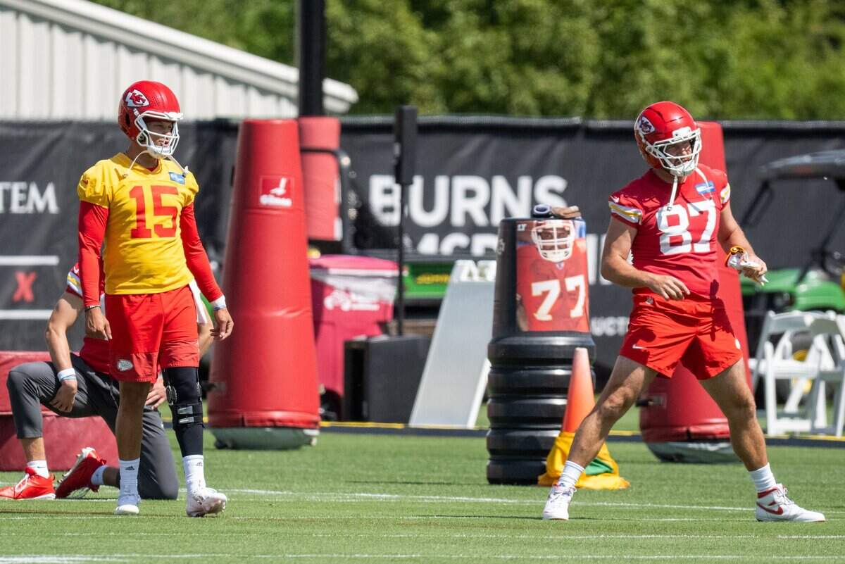 Kansas City Chiefs tight end Travis Kelce and quarterback Patrick Mahomes stretch during Chiefs Minicamp on Tuesday, June 9, 2026, in Kansas City.