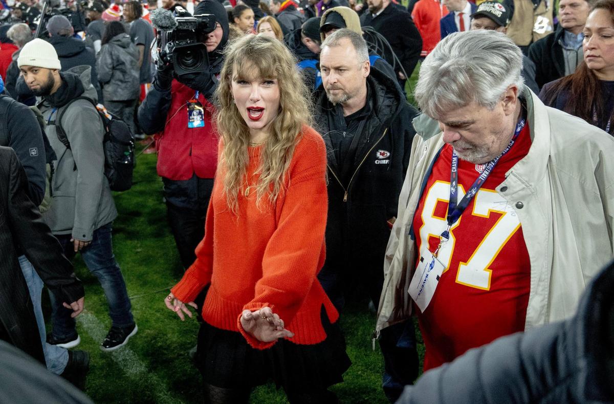 Pop star Taylor Swift walks off the field after the Chiefs defeated the Baltimore Ravens 17-10 in the AFC Championship Game on Sunday, Jan. 28, 2024, in Baltimore.