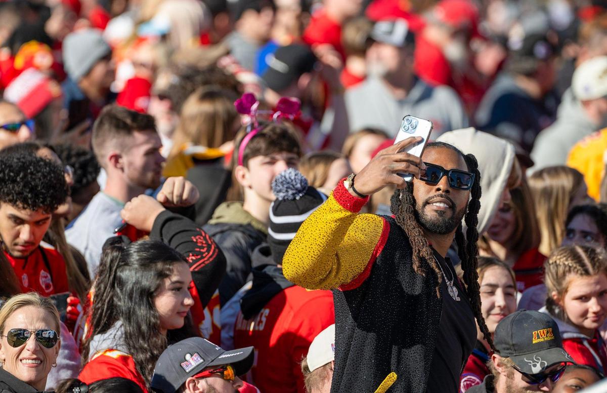 Former Kansas City Chiefs wide receiver Dwayne Bowe took selfies with the crowd gathered to celebrate the Super Bowl LVIII championship on Wednesday, Feb. 14, 2024, at Union Station in Kansas City.