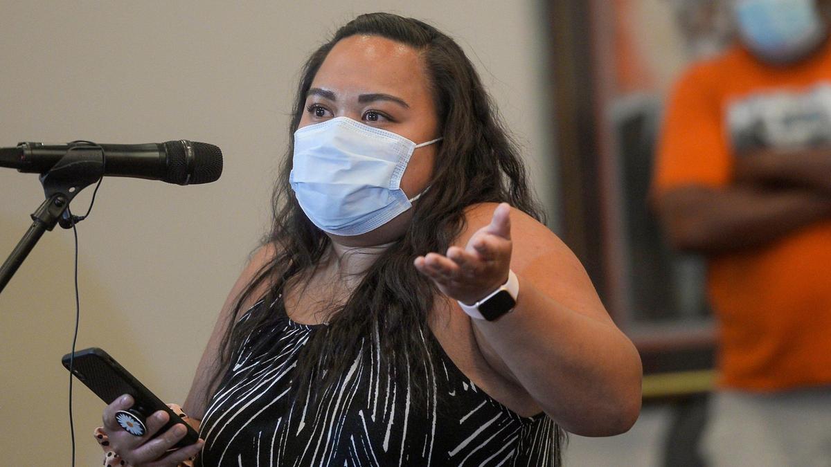 Katrina Abella lives in Oak Meyer Gardens, developed by the J.C. Nichols Co. She said her family would not have been allowed to live there back when the neighborhood was built.