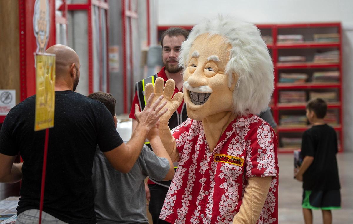 The Ollie’s mascot was giving out high-fives as he greeted customers.