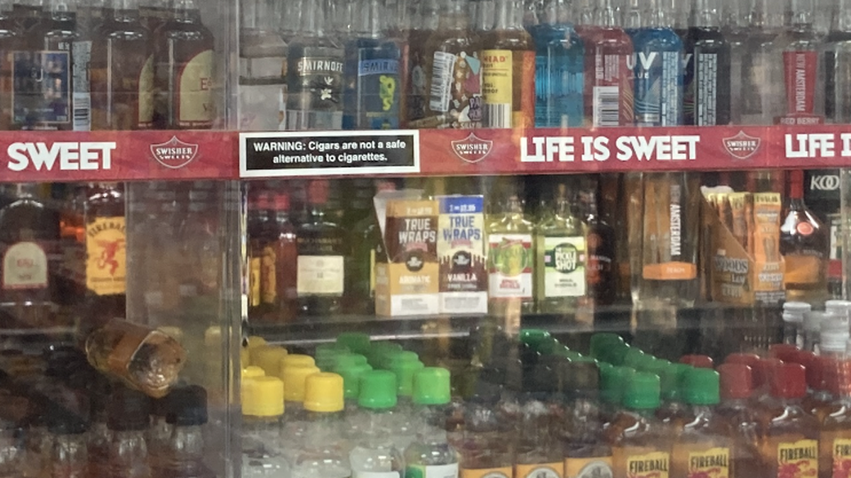 Mini liquor bottles as displayed a liquor store along Prospect Avenue in Kansas City.