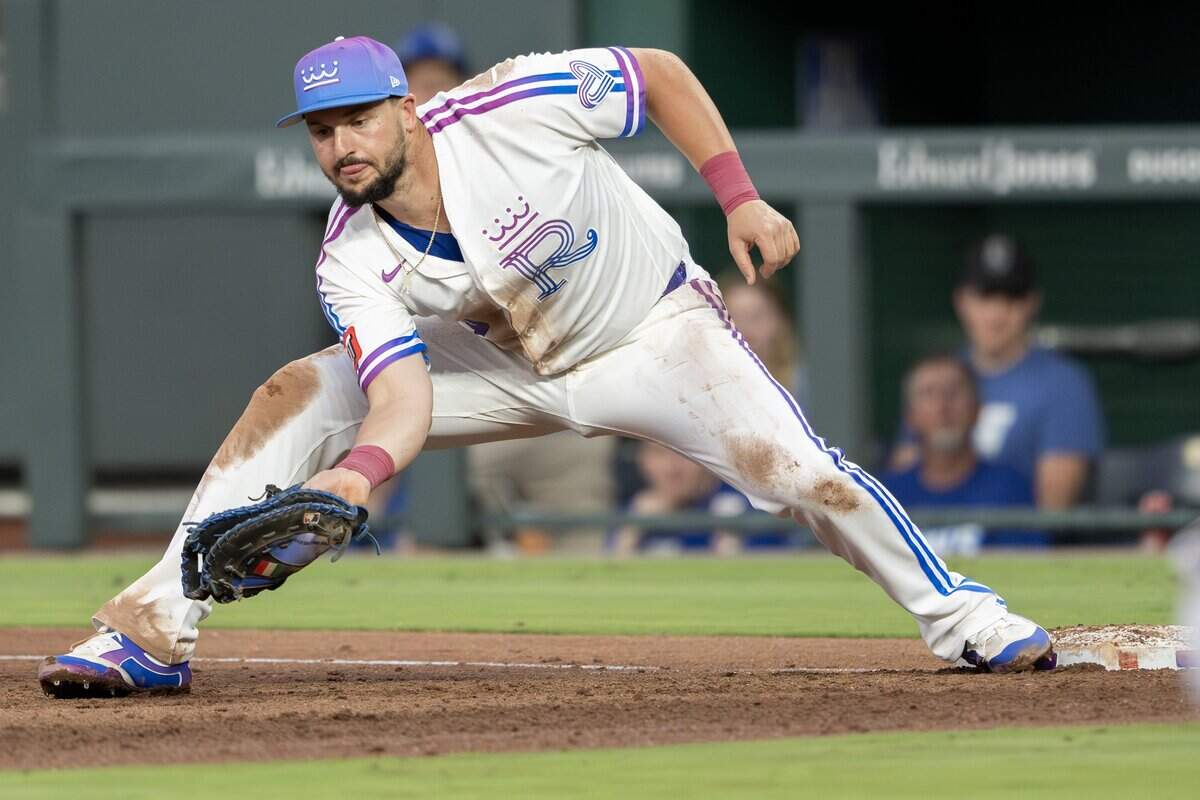Wearing the Kansas City Royals' new "Forever Fountains" City Connect uniform, first baseman Vinnie Pasquantino (9) catches a throw for an out in the third inning against the Houston Astros on Friday, June 12, 2026, at Kauffman Stadium in Kansas City.